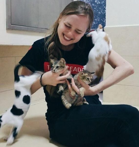 Irina Rudakova with her pet cats
