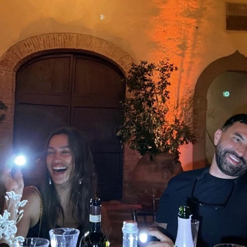 Irina Shayk with a glass of wine