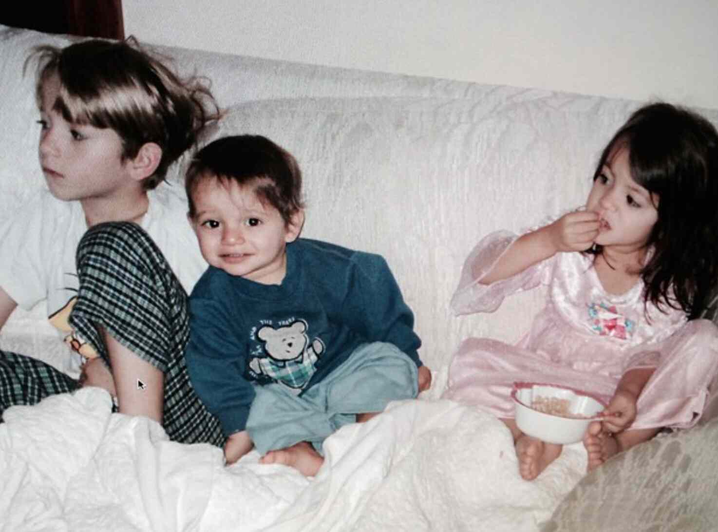 Isabela Merced and her brothers