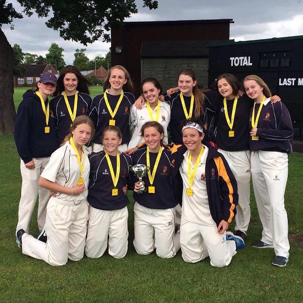 Isabelle Wong (sitting, extreme right) playing for her domestic team
