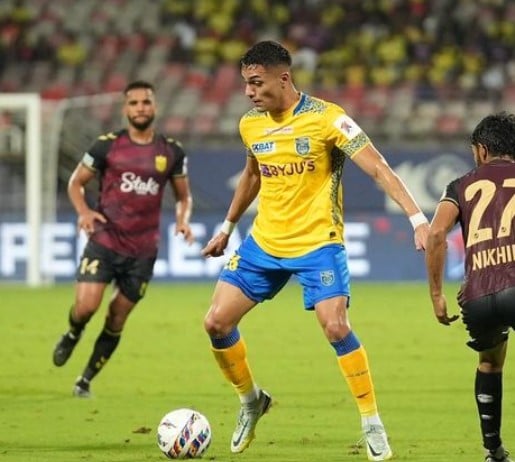 Ishan Pandita (in yellow) playing for Kerala Blasters FC