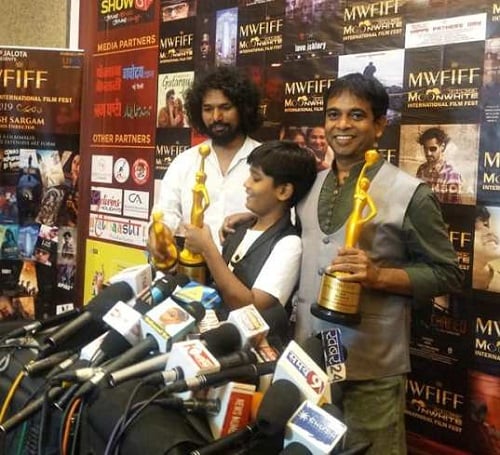 Ishtiyak Khan with his award