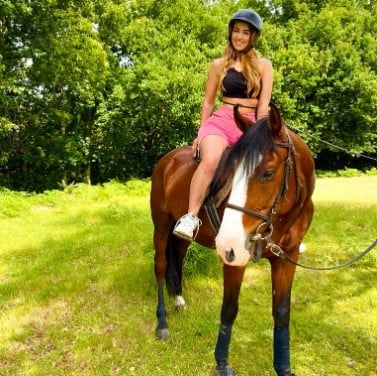 Iury Mellany while riding a horse