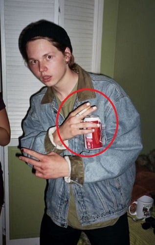 Jack Kilmer holding a cigarette