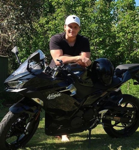 Jackson Warne with his motorcycle