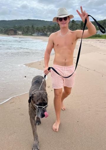 Jacob Bethell with his pet dog