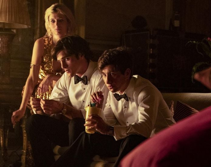 Jacob Elordi (left) with his co-stars in a scene from the film Saltburn