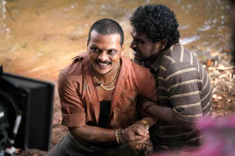 Jagadeesh Prathap Bandari (right) in Pushpa The Rise (2021)