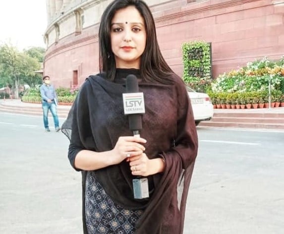 Jagrati Shukla while reporting for Lok Sabha TV