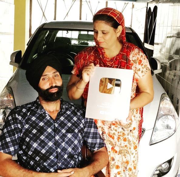 Jasbir Singh with his wife when he received the gold button
