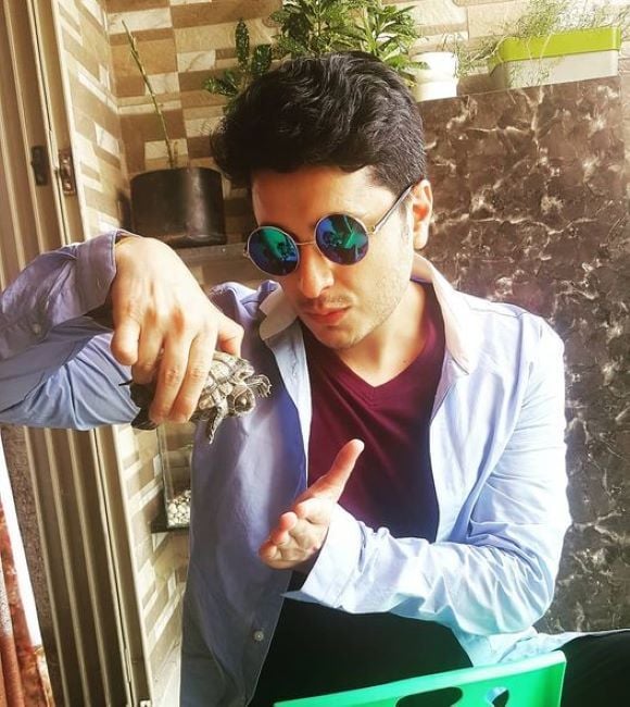 Jatin Suri with his pet turtle