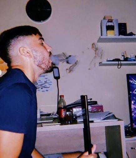 Jay Vella smoking a hookah