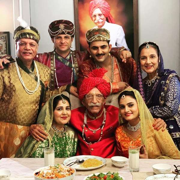 Jay Zaveri on the sets of MDH Masala advertisement posing with co-actors