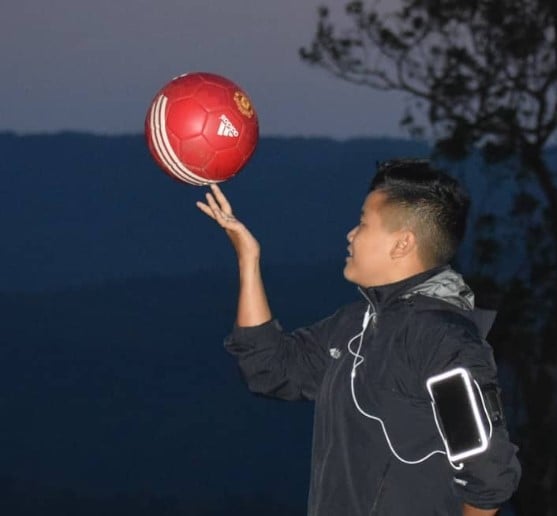 Jeanbi Gangmei posing with football