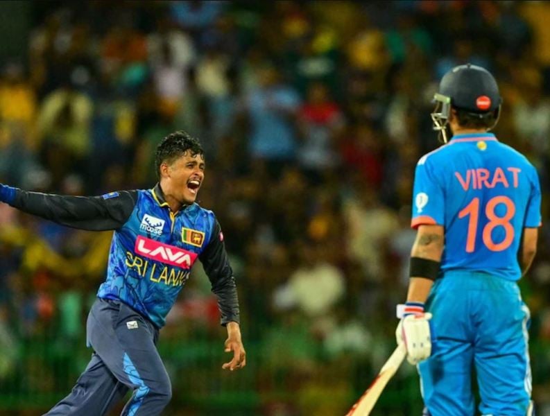 Jeffrey Vandersay celebrating after taking the wicket of Virat Kohli