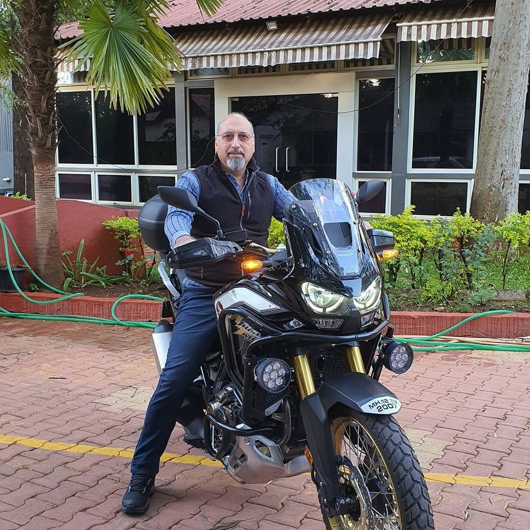Jehangir Dorabjee posing with his bike