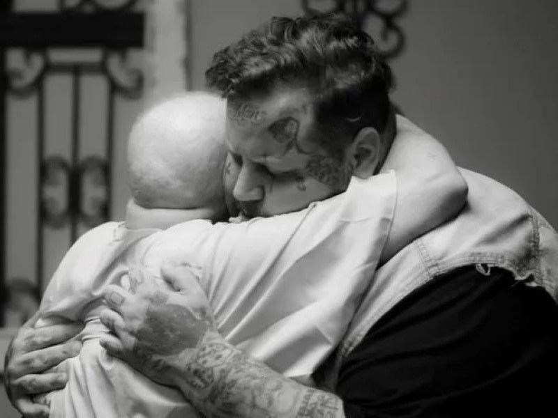 Jelly Roll hugging Suzanne Durham