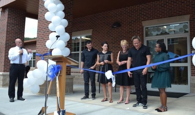 Jensen Huang with his family at the inauguration ceremony at Oneida Baptist Institute