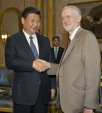 Jeremy Corbyn while posing with the Chinese President Xi Jinping at Buckingham Palace