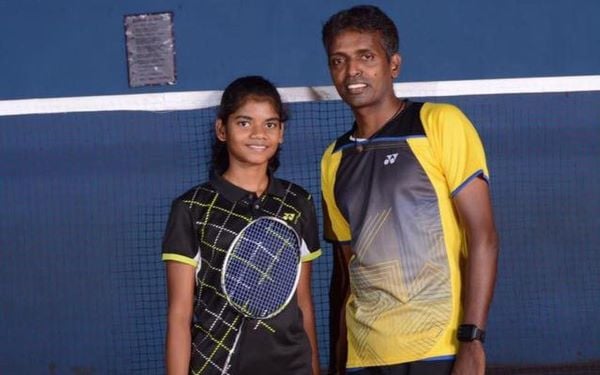 Jerlin Anika with her coach