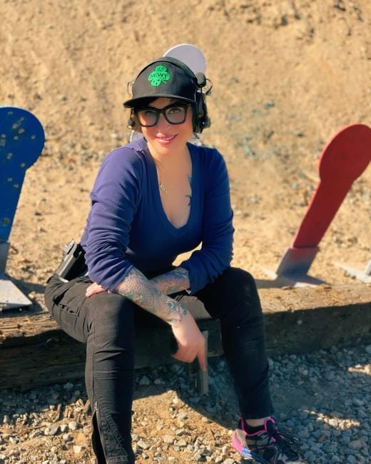 Jillian Lauren practising firearms shooting