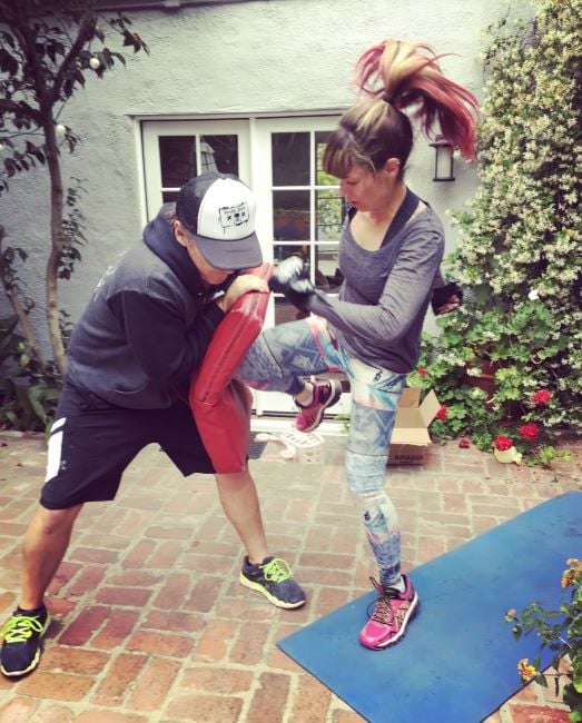 Jillian Lauren practising kickboxing