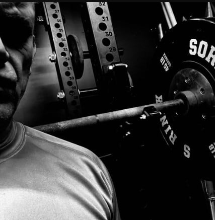 Jocko Willink posing at a gym