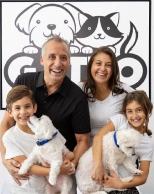 Joe Gatto with his family at the office of Gatto Pups and Friends