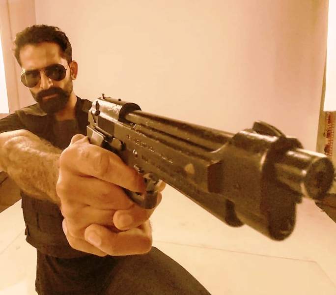 John as a police officer in the series Police Diary 2.0