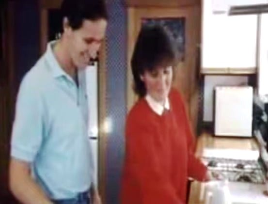 John with a co-worker at Merrill Lynch