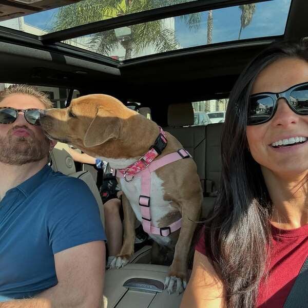 Jonah Platt with his pet dog and wife