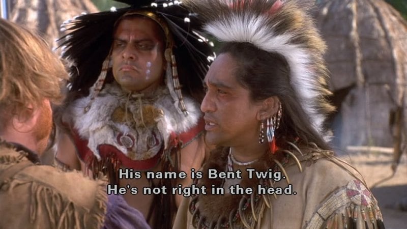 Jonathan Joss (left) as 