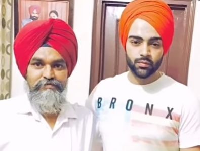 Jordan Sandhu with his Guru