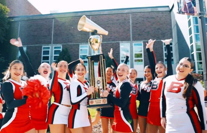 Jordon Hudson while celebrating a win with the BSU cheerleading squad