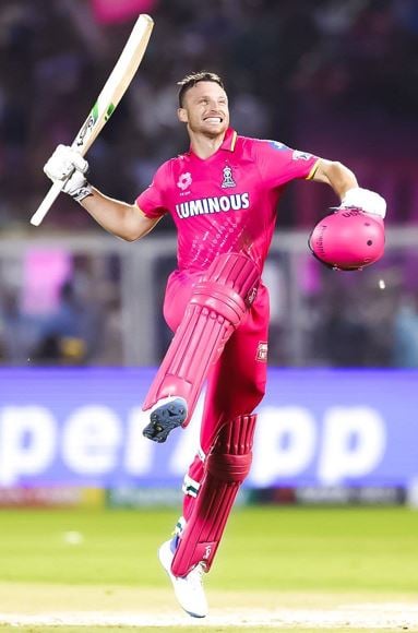 Jos Buttler celebrating his century in his 100th IPL match