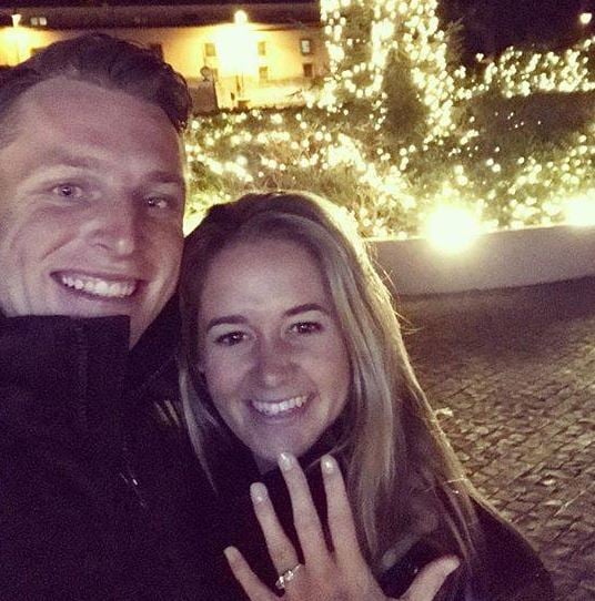 Jos Buttler with Louise Webber (right) when she accepted his proposal