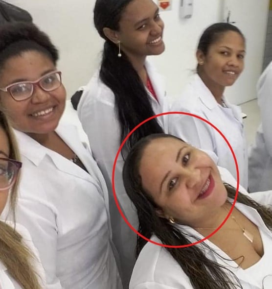 Joseane Ribeiro posing at her workplace