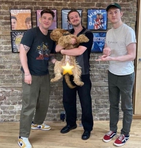 Joseph Quinn with a dog