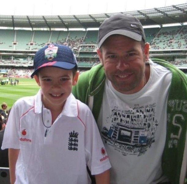 Josh Baker with his father during his early cricket days
