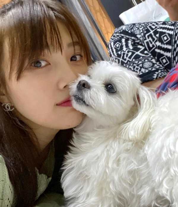Joy with her pet dog
