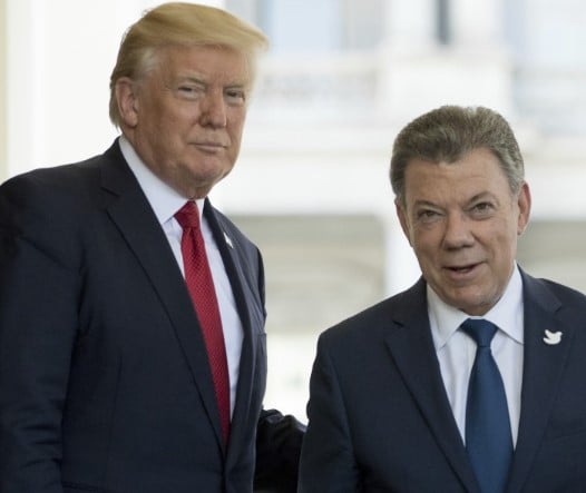 Juan Manuel Santos posing with Donald Trump