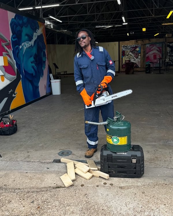 Julian Brown demonstrating his Plastoline fuel by powering a chainsaw