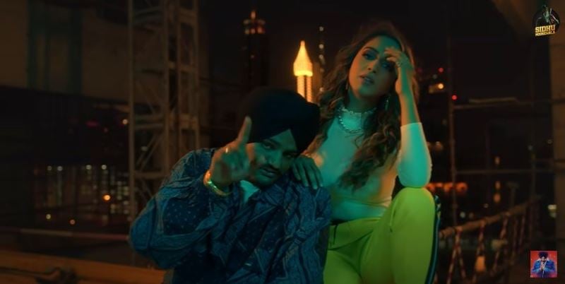 Jumana Khan with Sidhu Moose Wala in a still from the 2021 Punjabi song GOAT