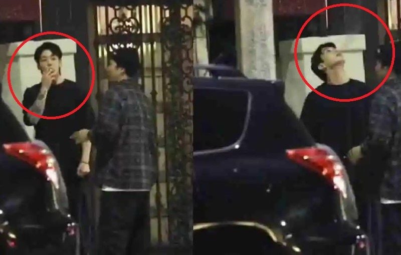 Jungkook smoking outside a restaurant in LA