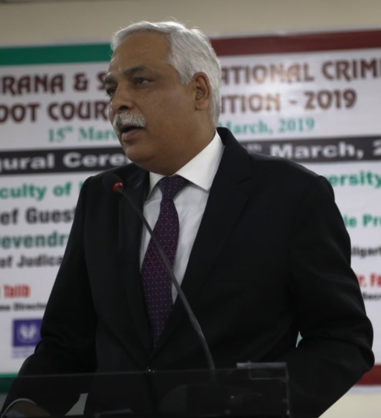 Justice Devendra Kumar Upadhyaya delivering a guest lecture at Aligarh Muslim University