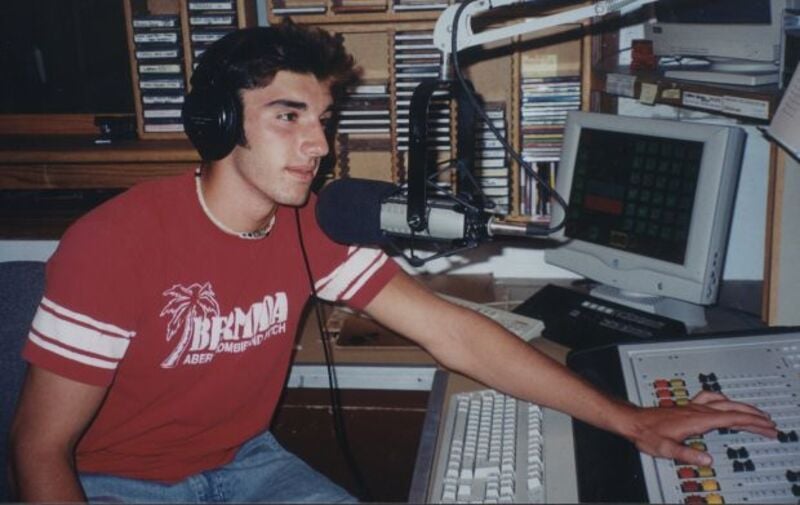 Justin Baldoni as a disc jockey