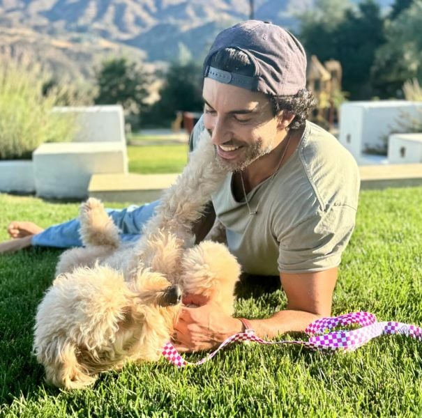 Justin Baldoni with his pet dog
