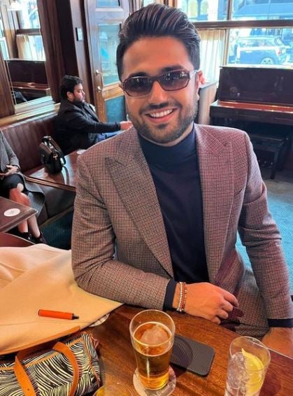 Kabir Bahia drinking beer