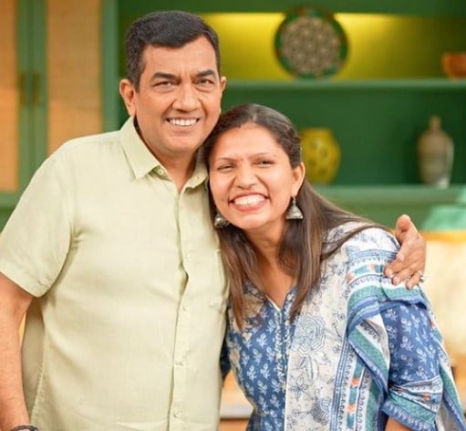 Kabita Singh posing with chef Sanjeev Kapoor