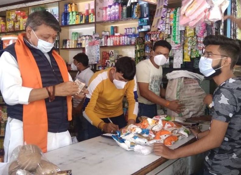Kailash Vijayavargiya selling food items at his traditional grocery shop in Indore on the occasion of Dhanteras